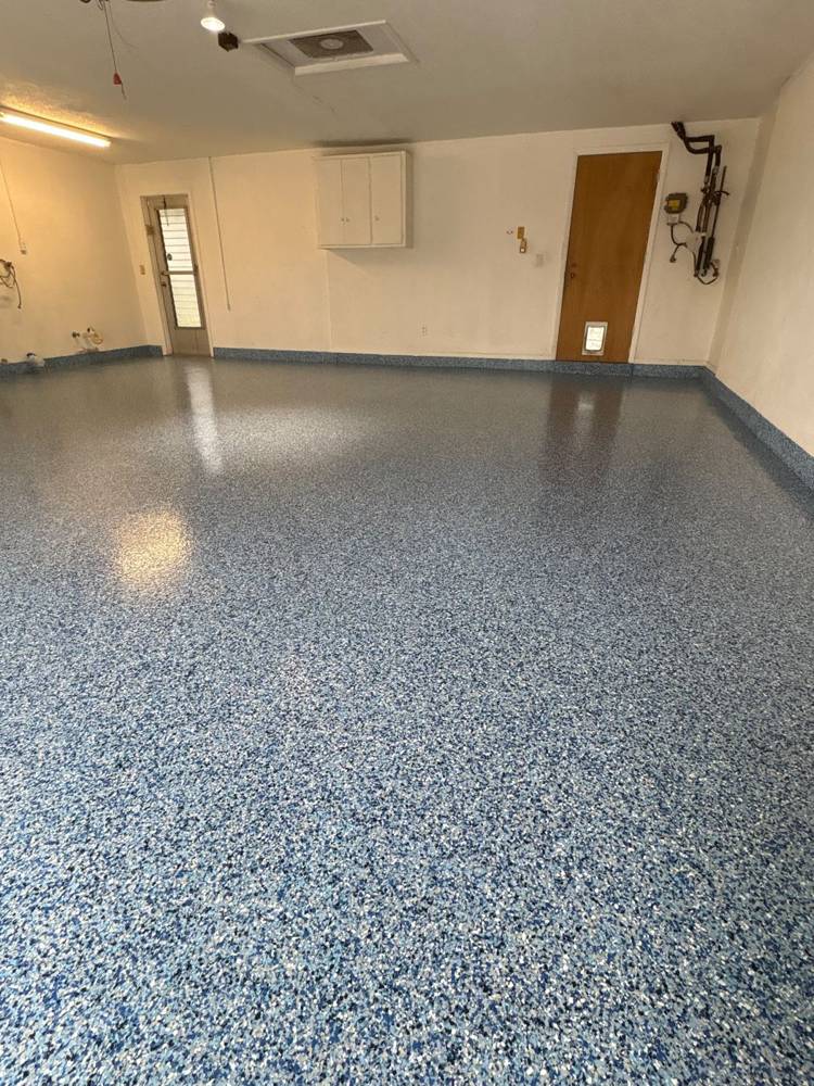 Glossy blue epoxy flake garage floor