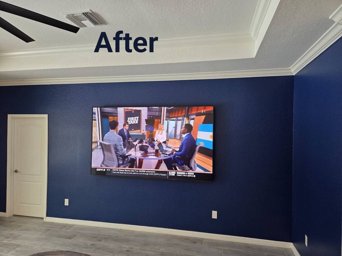 Navy accent wall with mounted TV